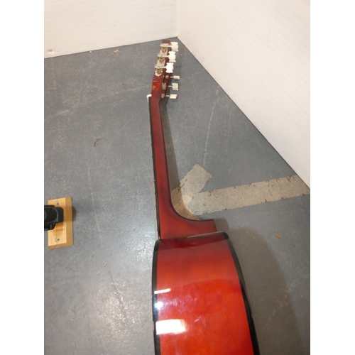 47 - Encore acoustic guitair, model ENC340FT, in carry case, and a guitar wall hook....