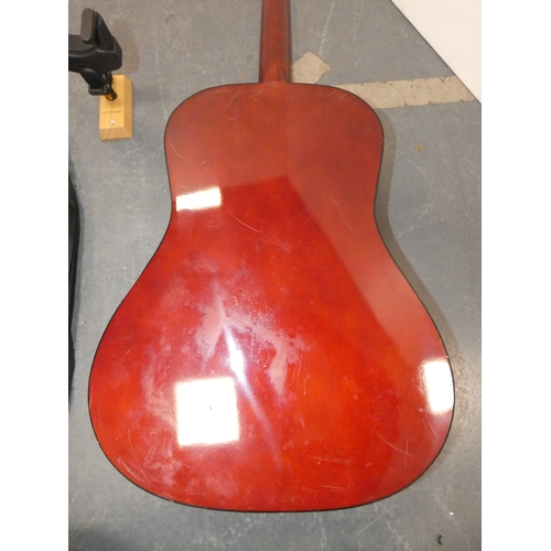 47 - Encore acoustic guitair, model ENC340FT, in carry case, and a guitar wall hook....