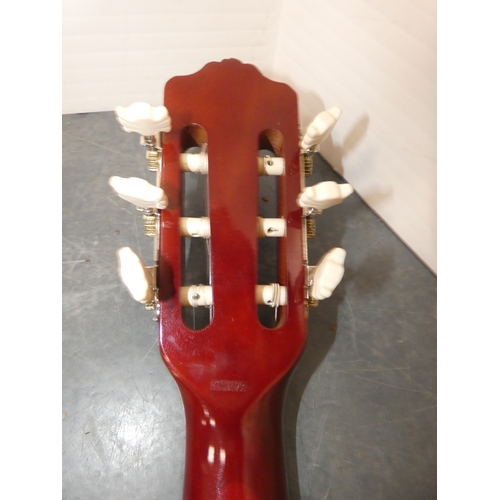 47 - Encore acoustic guitair, model ENC340FT, in carry case, and a guitar wall hook....