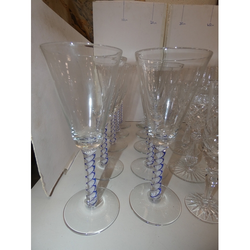 49 - Set of eleven matching wine glasses with airtwist stems, and other crystal and glass wine glasses....