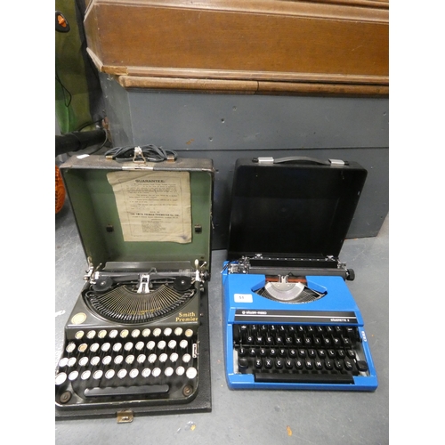 51 - Silver-Reed Silverette II typewriter and Smith Premier typewriter, both cased....