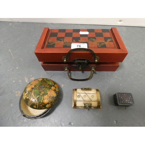 76 - Modern boxed Chinese export chess pieces in red and white resin, depicting various immortals and oth... 