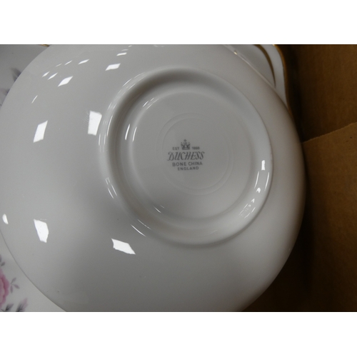 9 - Three cartons containing Duchess china floral decorated teawares....