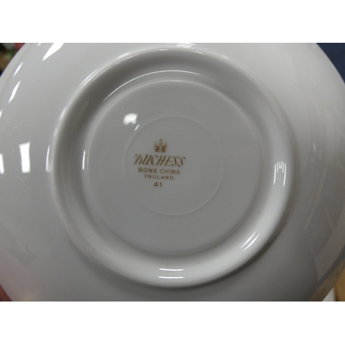 9 - Three cartons containing Duchess china floral decorated teawares....