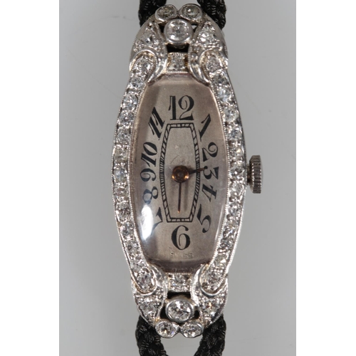 175 - Ladies platinum and diamond art deco cocktail watch, the case set with 44 diamonds, approximately 0.... 