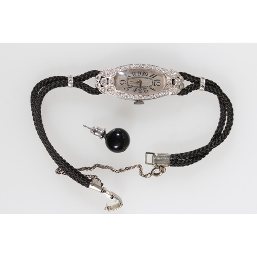 175 - Ladies platinum and diamond art deco cocktail watch, the case set with 44 diamonds, approximately 0.... 