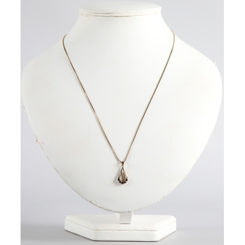 106 - 9ct gold gem set pendant on 14K gold necklace, gross weight 3.8g
