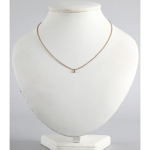 109 - 9ct gold chain with small diamond solitaire pendant, 2.6g