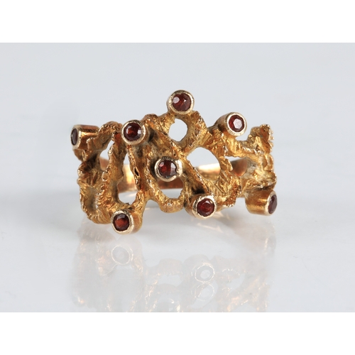 111 - Mid Century style 9ct gold ring set with garnets, ring size L, 4g