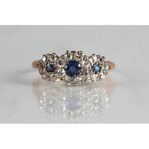 117 - 18ct gold diamond and sapphire cluster ring, ring size N, 3.1g
