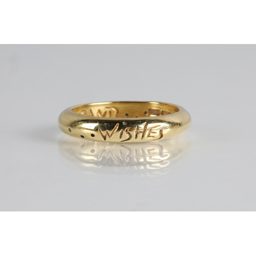 62 - 18ct gold band assayed in 2000, engraved over the inside and out with a phrase 'Two Thousand Wishes'... 