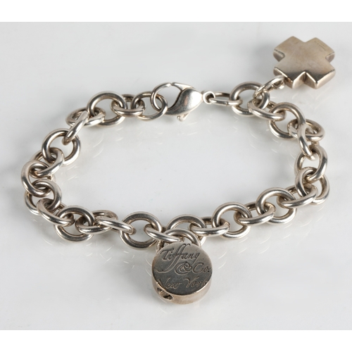 78 - Tiffany & Co. silver charm bracelet, 49g