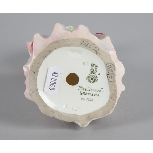 18 - Royal Doulton ‘Miss Demure’ figure HN 1402, 19cm h.(Damaged)