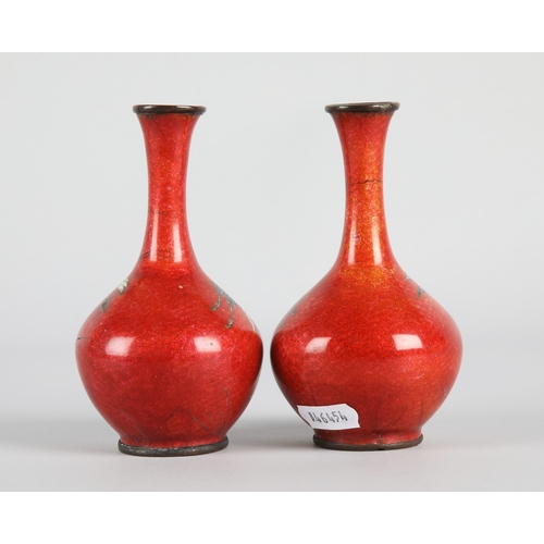 2 - Pair red ground cloisonne vases depicting cranes, each 12.5cm h. with impressed marks to base