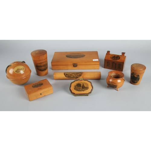 32 - Collection of Mauchline ware to include miniature caldron, string ball, trinket boxes, house form mo... 