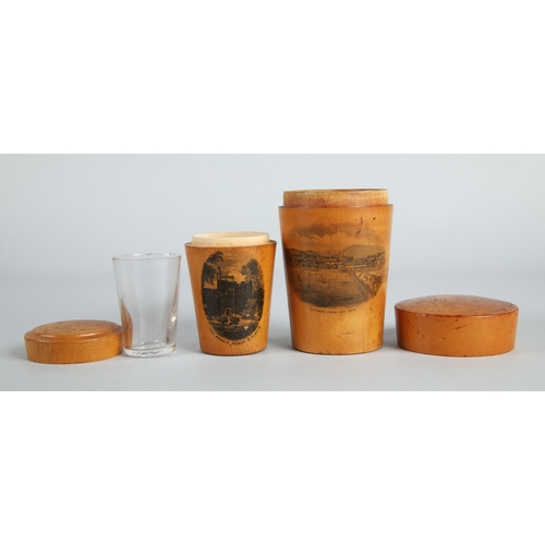 32 - Collection of Mauchline ware to include miniature caldron, string ball, trinket boxes, house form mo... 