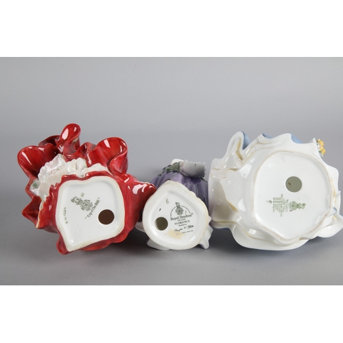 34 - Five Royal Doulton figures to include 'Paisley Shawl' HN 1988, 'Top o' the Hill' HN 1834, 'Florence'... 