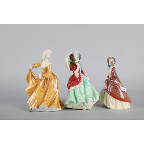 34 - Five Royal Doulton figures to include 'Paisley Shawl' HN 1988, 'Top o' the Hill' HN 1834, 'Florence'... 