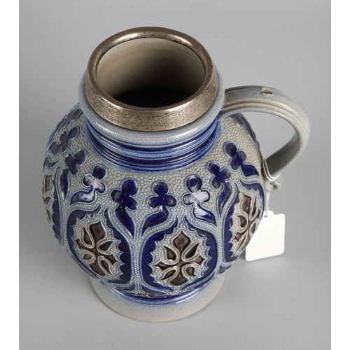 35 - German style salt-glazed silver mounted jug, 18cm h.