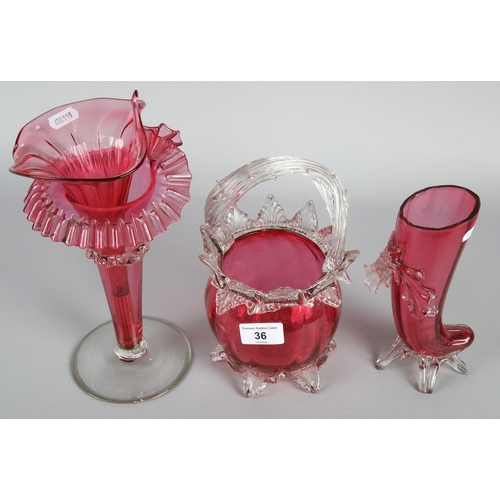 36 - Cranberry art glass fluted vase, basket and footed vase (3).