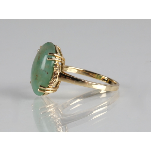60 - 9ct gold ring set with a cloudy blue gemstone, ring size R/S, 3.7g