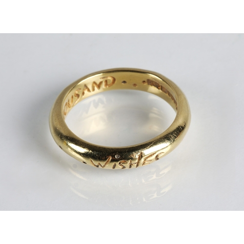 62 - 18ct gold band assayed in 2000, engraved over the inside and out with a phrase 'Two Thousand Wishes'... 