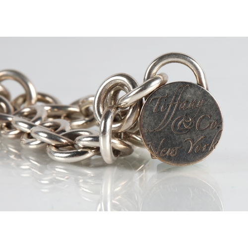 78 - Tiffany & Co. silver charm bracelet, 49g