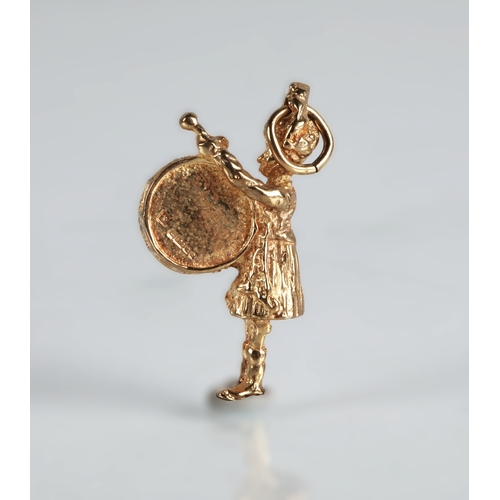 85 - 9ct gold drummer charm, 6.8g