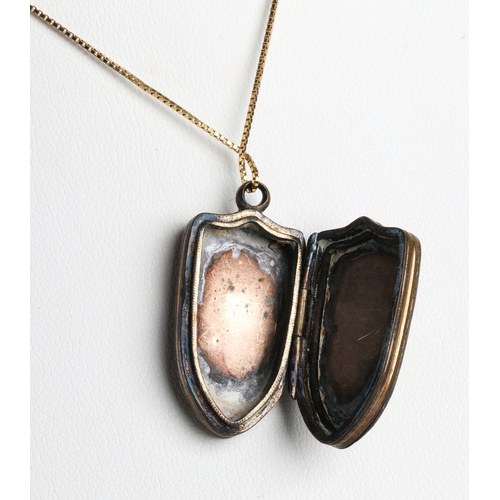 107 - Gilt locket of shield form on 9ct chain, chain weight 1g approx.