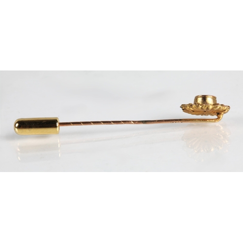 108 - 9ct gold stick pin set with a ruby, 0.9g