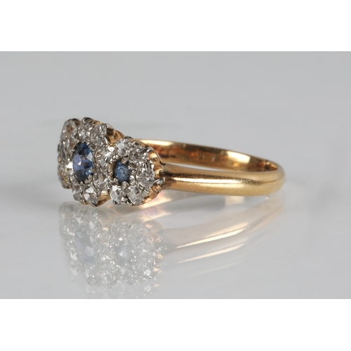 117 - 18ct gold diamond and sapphire cluster ring, ring size N, 3.1g