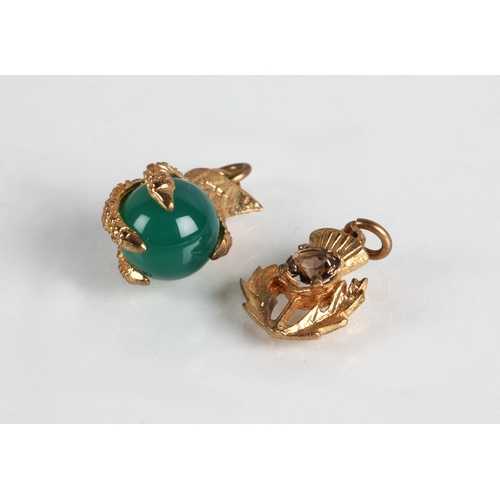 94 - 9ct gold claw charm and 9ct thistle charm, gross weight 5.8g