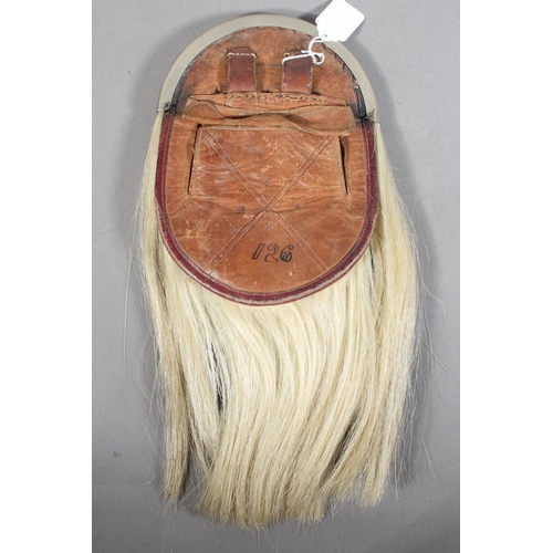 1711 - Scottish military style horse hair sporran having six black tassels, white metal and black leather c... 