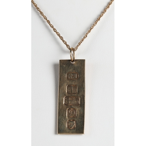 56 - 9ct gold ingot on 9ct gold chain, gross weight 9.5g.