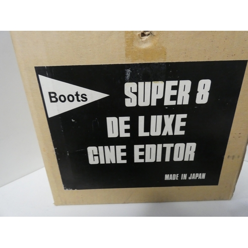 107 - Shelf lot of cameras to include Minolta X-300, digital camera, Super 8 cine camera and HP Deskjet pr... 