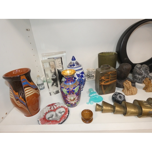 113 - Three shelves of sundries to include Panasonic 2-alarm/clock and cd player, fan heater, ornaments to... 