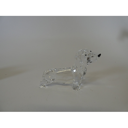 135 - Group of graduated Dachshund figures, and another in glass. (5)