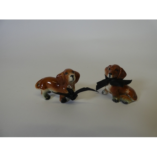 135 - Group of graduated Dachshund figures, and another in glass. (5)