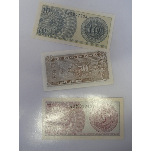 145 - Collection of world banknotes to include Japan, Indonesia, Paraguay, Chile and Bulgaria.