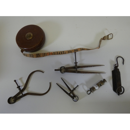 146 - Set of drawing instruments in fitted case, Chesterman tape measure, spring scales, The Metropolitan ... 