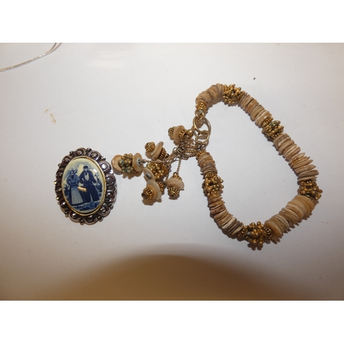 156 - Jewellery box containing costume jewellery to include chains, wristwatches and pendants etc.