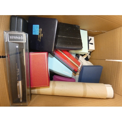 158 - Two boxes of costume jewellery and curios to include Parker and Papermate pens, boxed earrings, broo... 