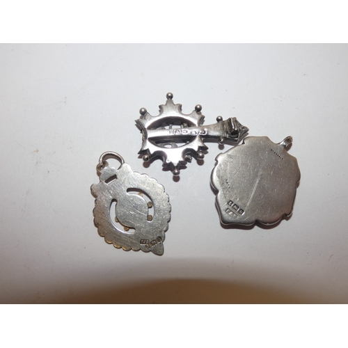 178 - Silver overlaid pendant and two silver medal fobs, 178g gross.  (3)