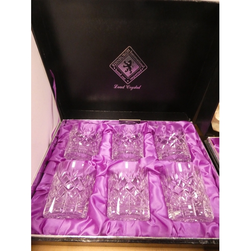 61 - Four boxed sets of Edinburgh Crystal to include whisky tumblers and vases.