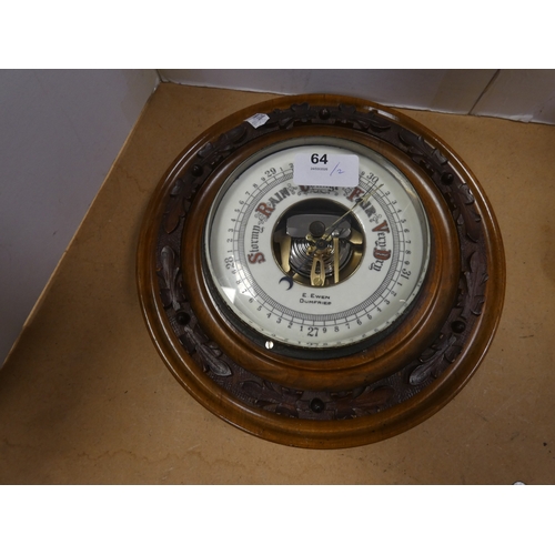 64 - Blackamoor coin bank and wall barometer, named to the dial E. Ewen, Dumfries. (2)
