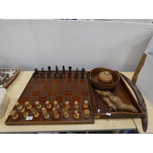 77 - Chess board with African tribal themed pieces, tray and boomerang etc.