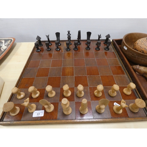 77 - Chess board with African tribal themed pieces, tray and boomerang etc.