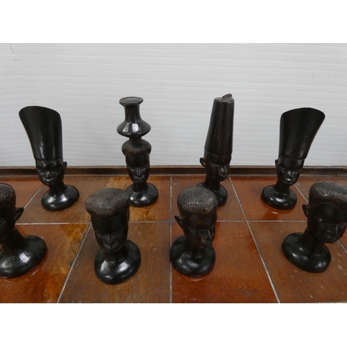 77 - Chess board with African tribal themed pieces, tray and boomerang etc.