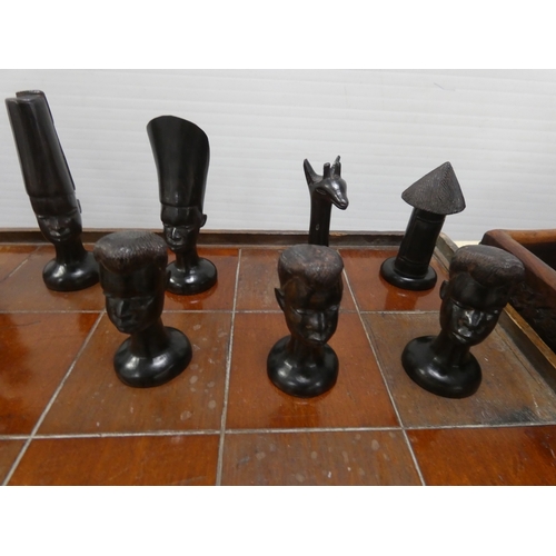 77 - Chess board with African tribal themed pieces, tray and boomerang etc.