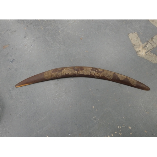 77 - Chess board with African tribal themed pieces, tray and boomerang etc.